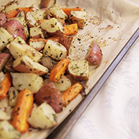 "roasted potatoes in a baking tray"
