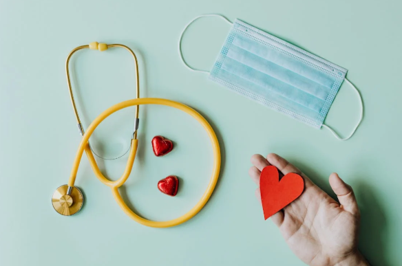 Stethoscope next to a heart