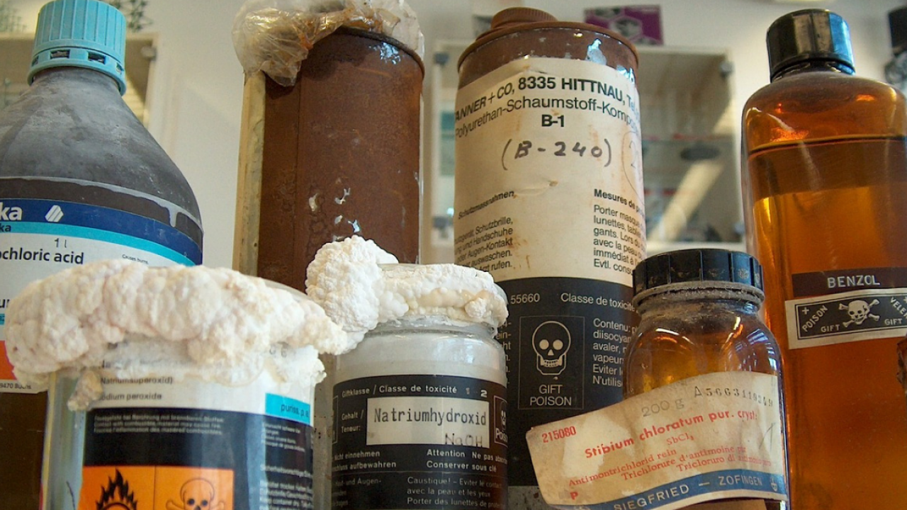 chemical waste containers in laboratory