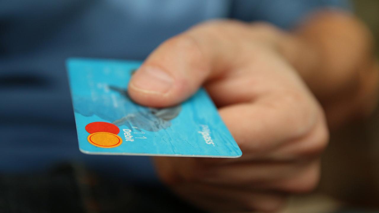 male hand with a credit card