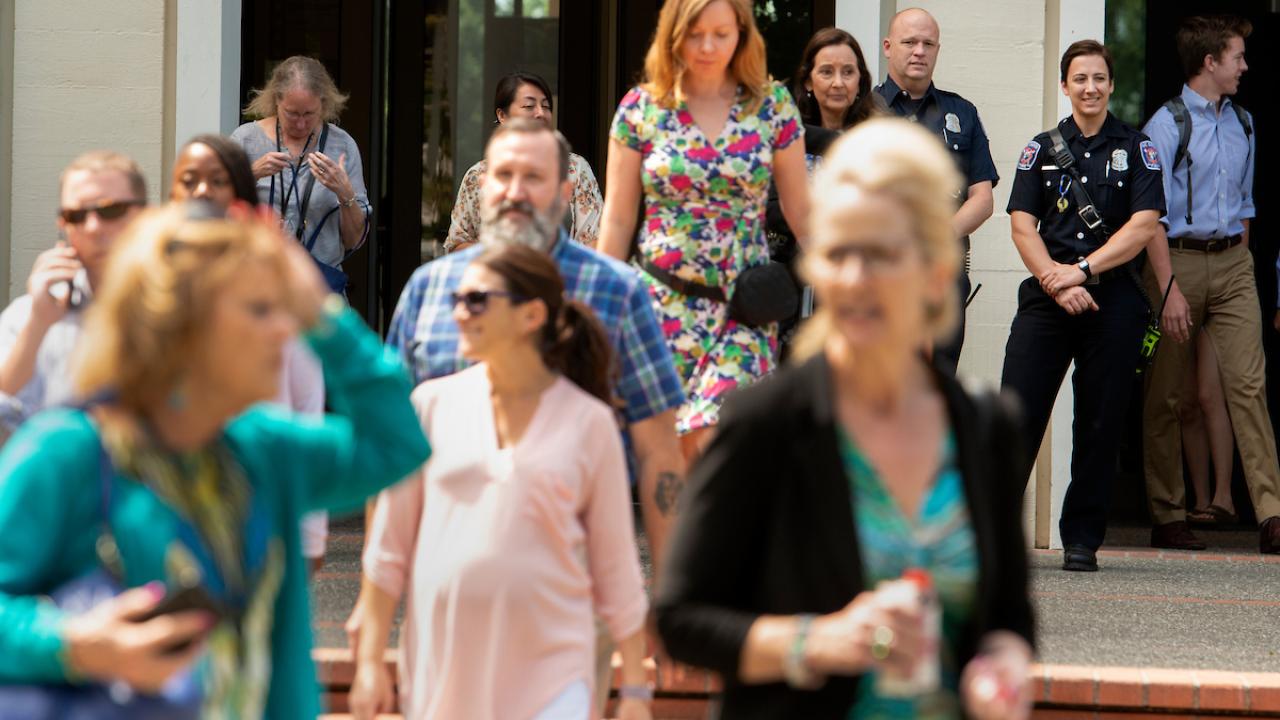 Mrak Hall Fire Drill, people pictured exiting the building