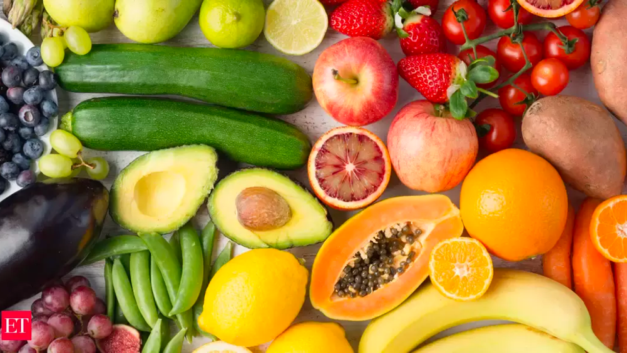 array of colorful fruits and vegetables from every color of the rainbow