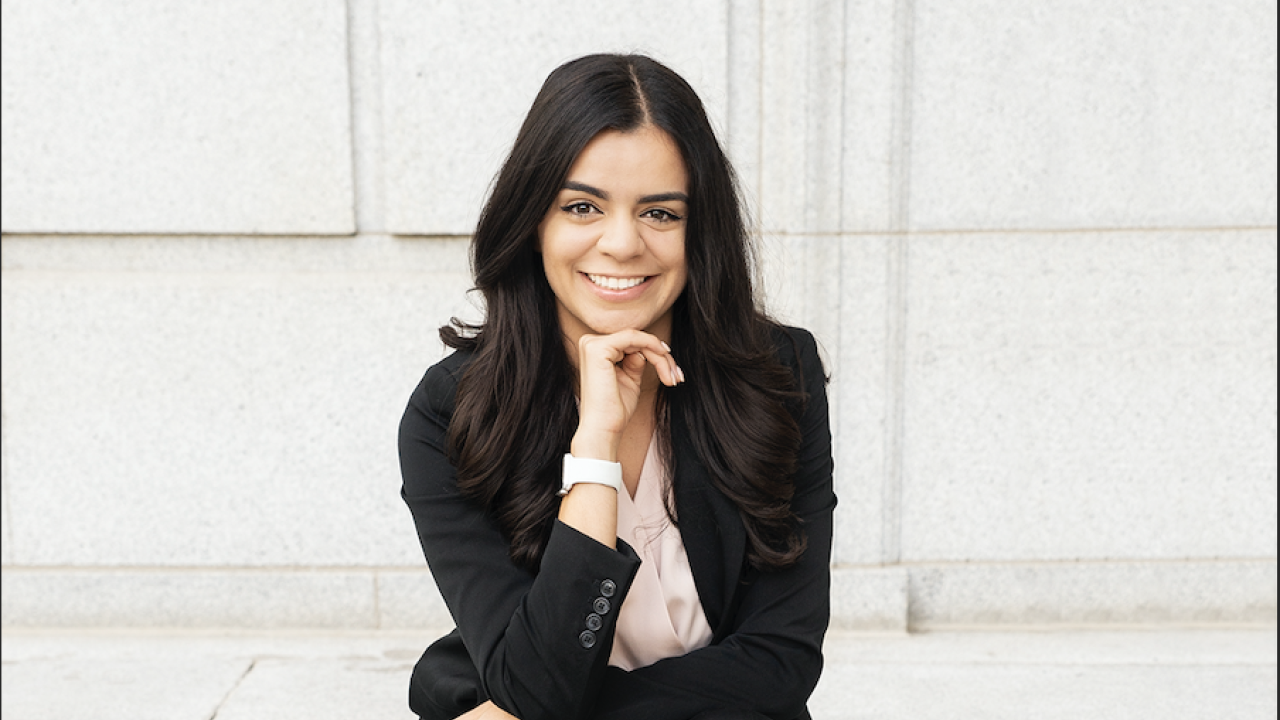 Vanessa seated on stone steps