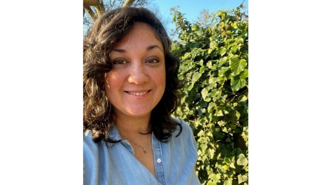 A selfie of Nikki taken outdoors