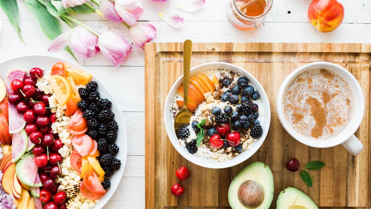 tabletop of colorful fruits and vegetable medley