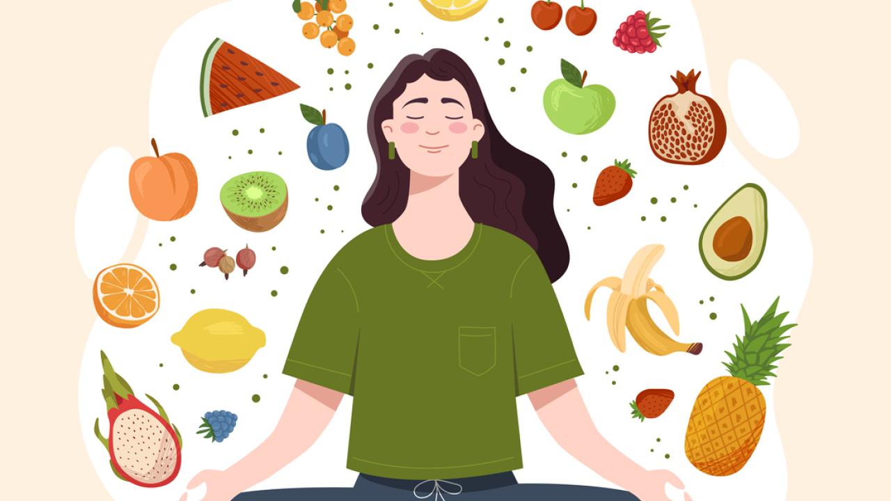 a girl meditates as she thinks about mindful eating