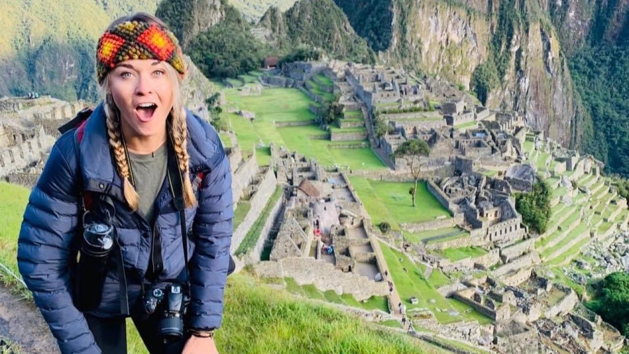 Corrie standing next to Machu Picchu