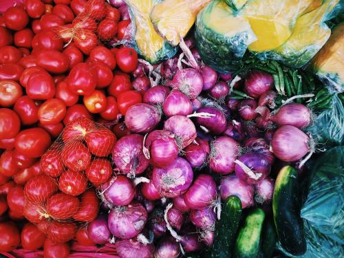 Fresh onions, tomatoes, and cucumbers