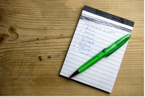 list with a pen on it