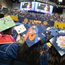 Image of student graduation caps at a ceremony