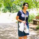 woman walking through the uc davis arboretum