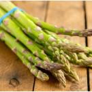 a bunch of asparagus on a table