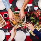 people gather to enjoy some holiday food 