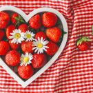 Heart dish filled with strawberries