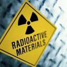 A yellow warning sign that reads "Radioactive Materials"